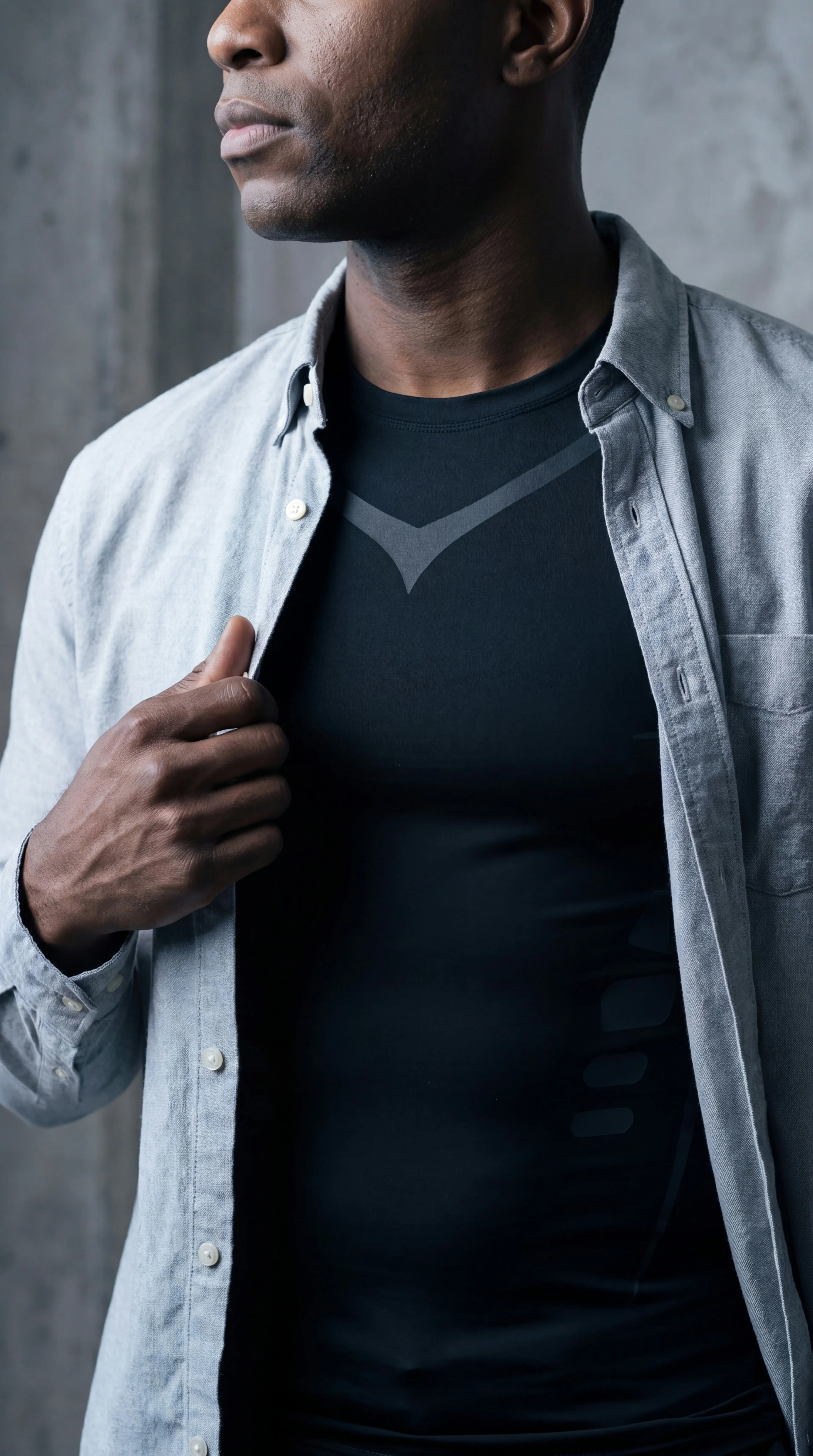 BSLYR Hidden — structural base layer worn under an open oxford
